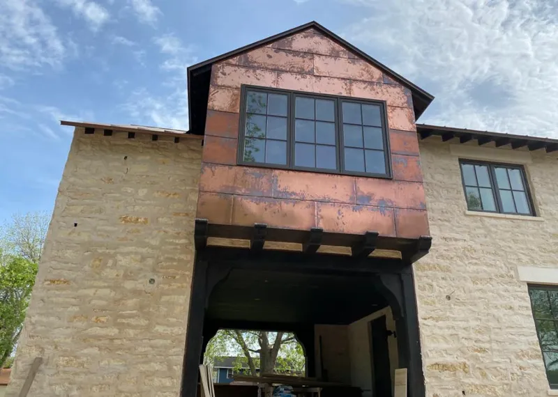 Copper metal panel facade on a stone building for Skylight Installation in Tamalpais-Homestead Valley
