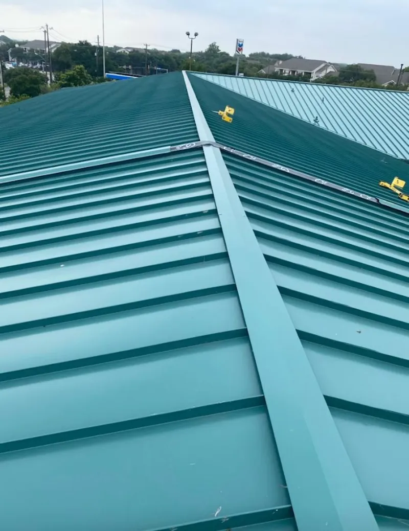 Green commercial metal roof ridge and valley for Metal Roof Repair in Tamalpais-Homestead Valley