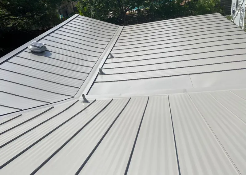 Solar attic fan installed on a metal roof for Roof Ventilation in Tamalpais-Homestead Valley